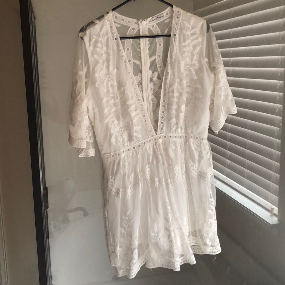White, sheer, low cut romper!